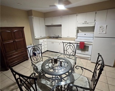 4901 Victoria Drive - Photo Thumbnail 4