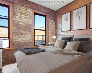 410 East 13th Street - Photo Thumbnail 2