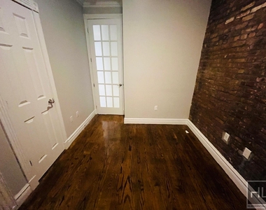 E 13th St. - Photo Thumbnail 1