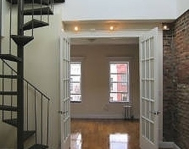 E 7th St. - Photo Thumbnail 3