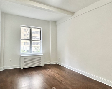 East 37 Street - Photo Thumbnail 3