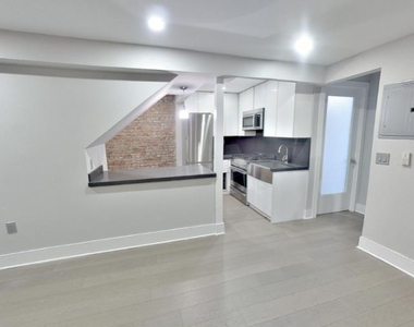 411 East 12th Street - Photo Thumbnail 1