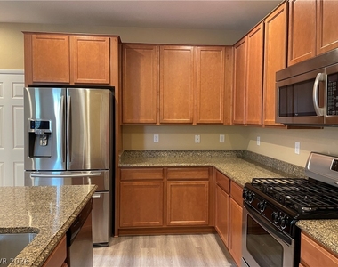 8620 Rowland Bluff Avenue - Photo Thumbnail 11