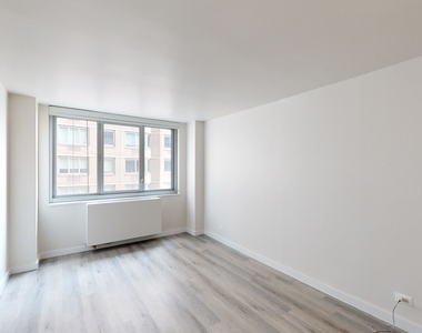 401 E 34th St - Photo Thumbnail 3