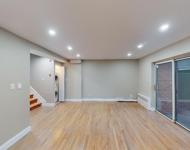 67-39 Clyde Street - Photo Thumbnail 2