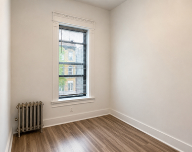 242 East 25th Street - Photo Thumbnail 4