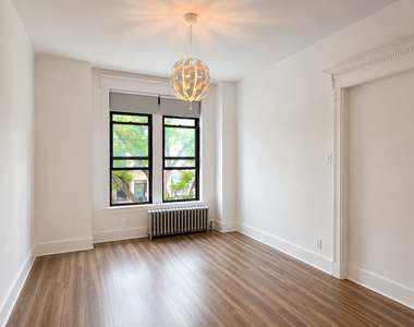 242 East 25th Street - Photo Thumbnail 2