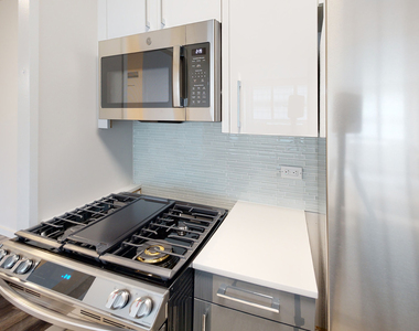 401 E 34th St - Photo Thumbnail 1