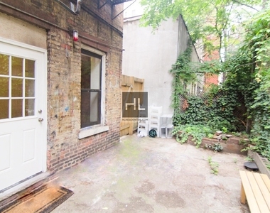 E 7th St. - Photo Thumbnail 2