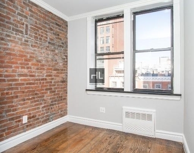 W 14th St. - Photo Thumbnail 2