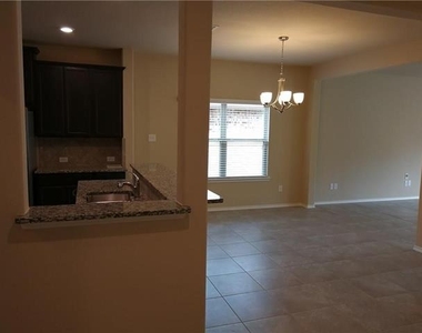9821 Prairie Dog Lane - Photo Thumbnail 3