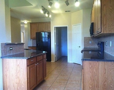 6100 Moor Hen Drive - Photo Thumbnail 3