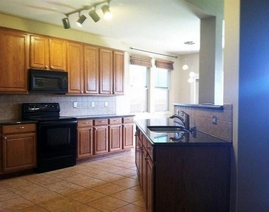 6100 Moor Hen Drive - Photo Thumbnail 2