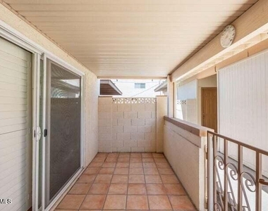 4848 N Woodmere Fairway -- - Photo Thumbnail 1
