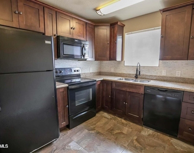 1161 E 5th Avenue - Photo Thumbnail 1