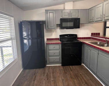 8015 Se Fairchild Way - Photo Thumbnail 5