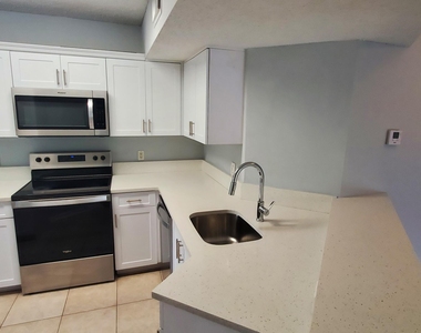 9033 Wiles Road - Photo Thumbnail 6
