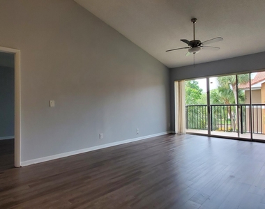 9033 Wiles Road - Photo Thumbnail 5