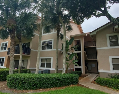 9033 Wiles Road - Photo Thumbnail 1