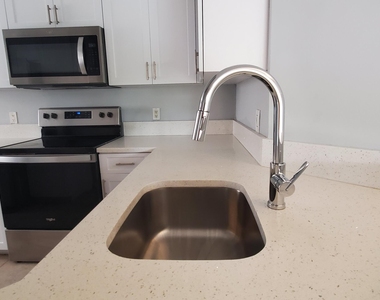 9033 Wiles Road - Photo Thumbnail 9