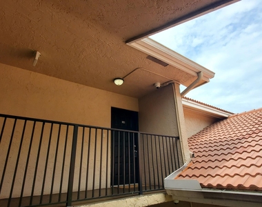 9033 Wiles Road - Photo Thumbnail 2
