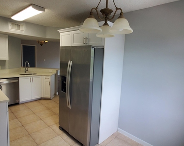9033 Wiles Road - Photo Thumbnail 8