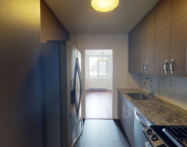401 E 34th St - Photo Thumbnail 3
