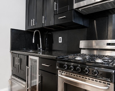 W 53rd St - Photo Thumbnail 1