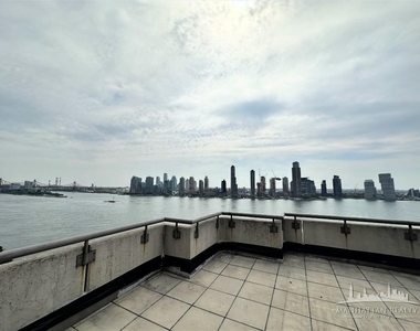 East 34th Street - Photo Thumbnail 6