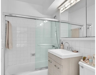 220 E 67th St - Photo Thumbnail 2