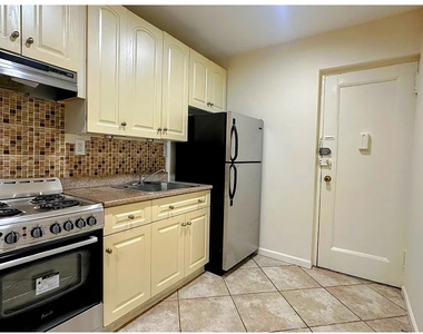 415 E 75th St - Photo Thumbnail 2