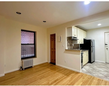 415 E 75th St - Photo Thumbnail 3