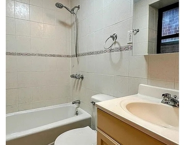 415 E 75th St - Photo Thumbnail 6