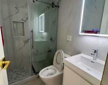 232-15 67th Avenue - Photo Thumbnail 4