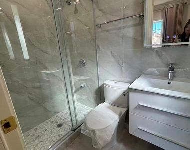 232-15 67th Avenue - Photo Thumbnail 3