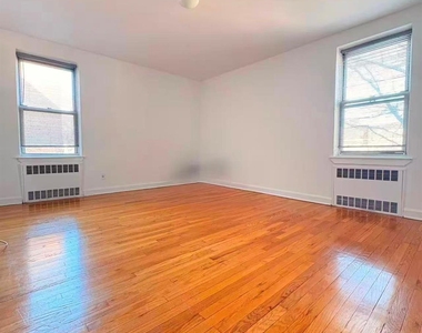 105-33 66th Avenue - Photo Thumbnail 2