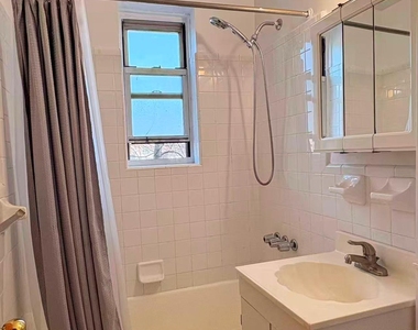 105-33 66th Avenue - Photo Thumbnail 4