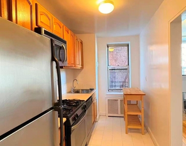 105-33 66th Avenue - Photo Thumbnail 3