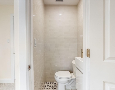 71-32 Loubet Street - Photo Thumbnail 8