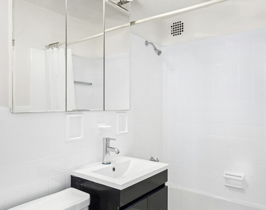 110 E 36th Street - Photo Thumbnail 3