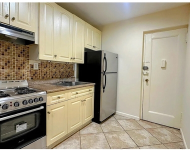 415 E 75th Street - Photo Thumbnail 2