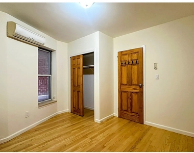 415 E 75th Street - Photo Thumbnail 8