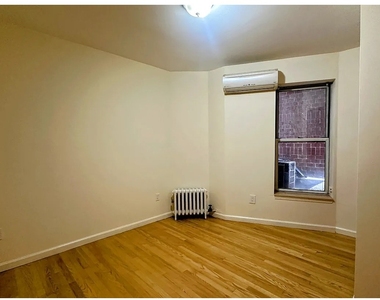 415 E 75th Street - Photo Thumbnail 7