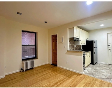 415 E 75th Street - Photo Thumbnail 3