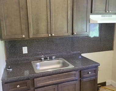 4818 Tackawanna Street - Photo Thumbnail 2