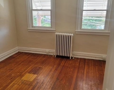 4818 Tackawanna Street - Photo Thumbnail 3
