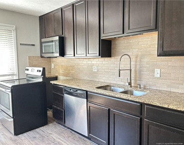5914 Rustlewood Drive - Photo Thumbnail 5