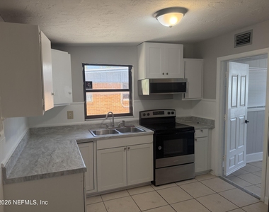 7336 Merrill Road - Photo Thumbnail 2