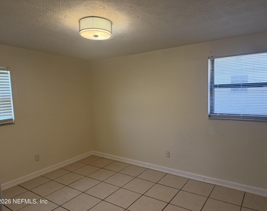 7336 Merrill Road - Photo Thumbnail 3