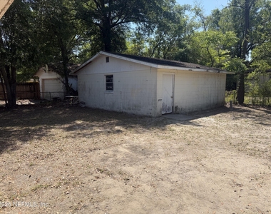 7336 Merrill Road - Photo Thumbnail 5